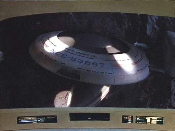 Pegasus byl objeven uvnitř jednoho z asteroidů. Enterprise se trhlinou vydává dovnitř a nachází loď z větší poloviny ve skále. 