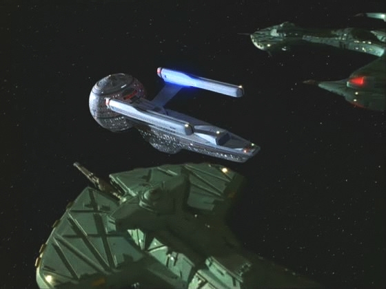 Pasteur i obě "minulé" Enterprise skenují anomálii s odbornými radami Picarda, který si už nyní pamatuje všechno. Na Pasteura však útočí klingonské lodě.