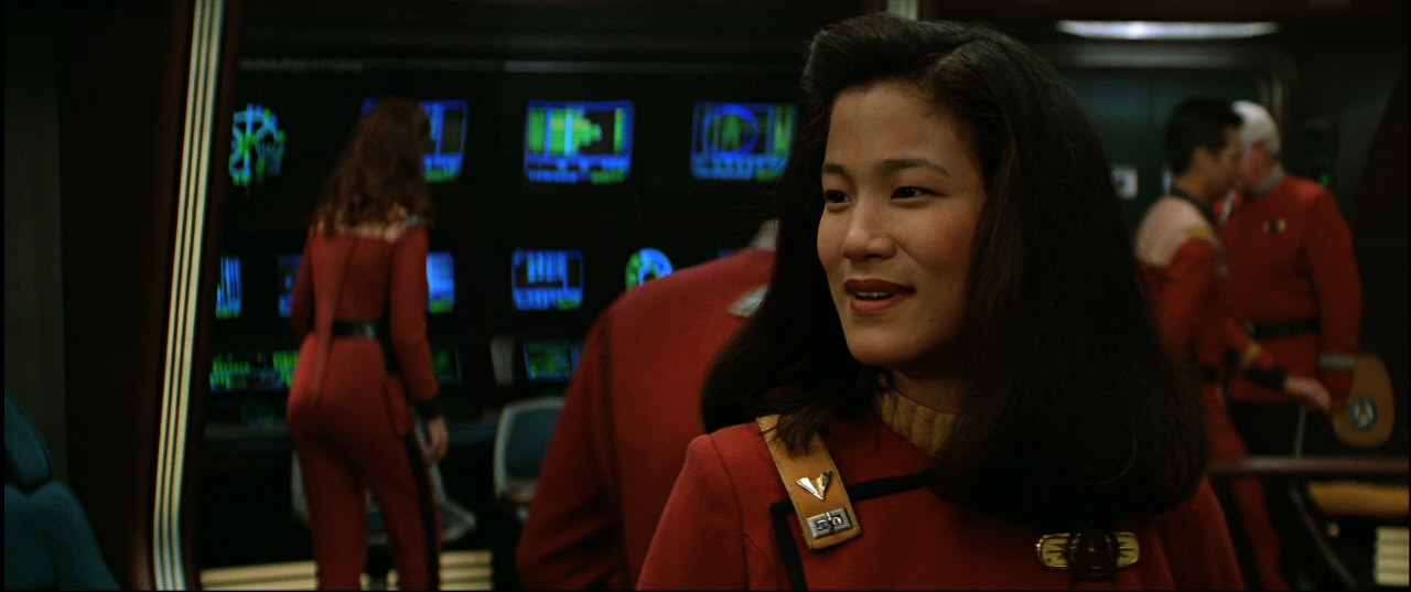Kormidelník Enterprise-B, poručík Demora Sulu, dcera Hikaru Sulu
