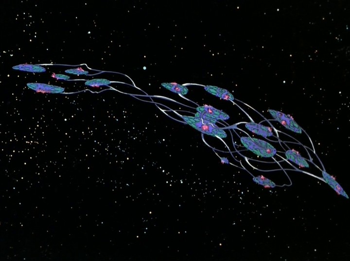 U kvasaru se vznáší prastará opuštěná mimozemská loď.