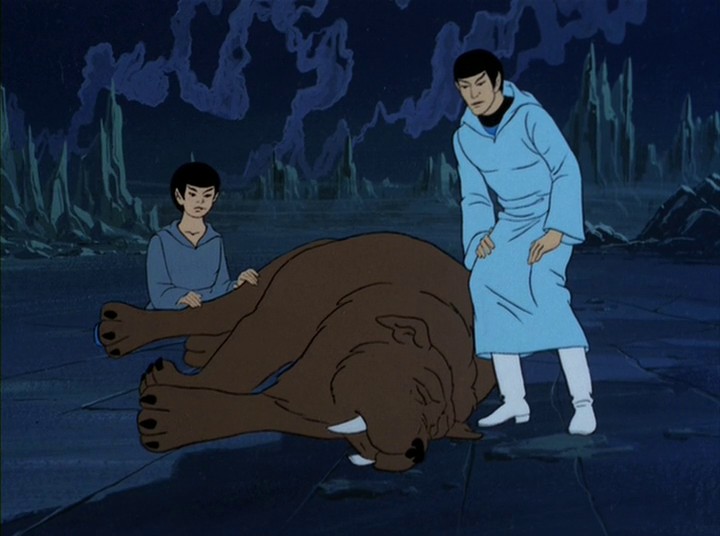 Spock a jeho mladší já si promluví o rodině a logice. Pak zjišťují, že je sehlat zraněn.
