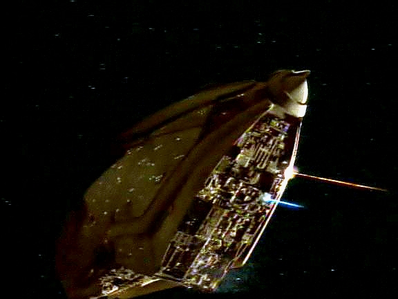 Voyager zatím čelí útoku Kazonů, kteří se chtějí zmocnit stanice. To však nelze dopustit, protože to je jediná cesta domů. Chakotay obětuje svou loď a zničí kazonský křižník.