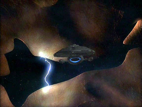 Ve skutečnosti je to obrovské stvoření požírající vesmírné lodě. Našlo v myslích posádky její největší přání a přilákalo si tak loď k sobě. Voyager je v jeho trávicím traktu.