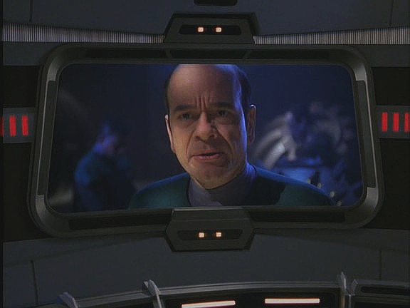 Léčí poškozené hologramy a kontaktuje Voyager, aby se za ně přimluvil. U kapitána ale neuspěl. Iden ho přesto vrací na Voyager, jak slíbil.