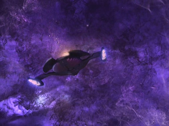 Poškozenou loď kapitána Siska stíhají Jem'Hadaři. Zkusí se tedy skrýt v mlhovině z temné hmoty,…