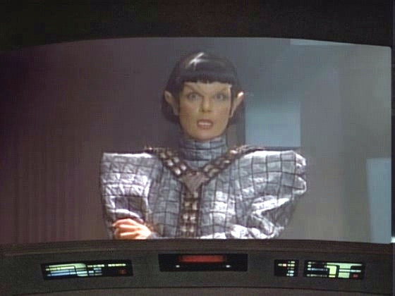 Nad planetou se objevila romulanská loď, a přestože subkomandér Taris vyhrožuje, je zřejmé, že má stejné potíže jako Enterprise. I ona si stahovala data z počítače Yamato.