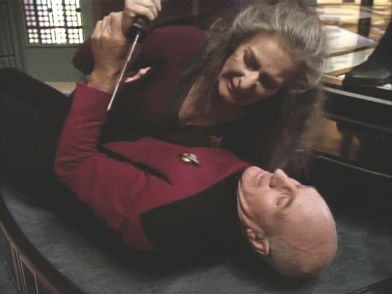 Alkar odmítl vzít ji s sebou na planetu na jednání, a tak se zestárlá Deanna pokusila mu v tom zabránit s nožem v ruce. Picarda zranila na paži, když se ji snažil zastavit.