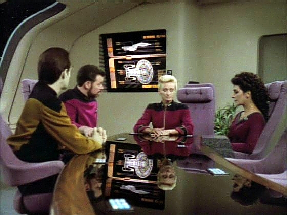 Riker není jmenován výkonným kapitánem, protože akci vyvolala aktivita Cardassianů a admirál potřebuje, aby vlajkové lodi Flotily velel někdo, kdo má s Cardassiany zkušenosti.