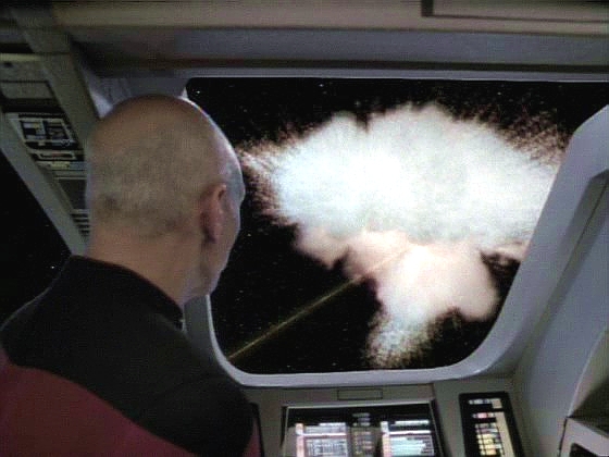 Sken způsobil, že se čas rozběhl. Kapitán sleduje z runaboutu explozi Enterprise. Pak se čas ale začne vracet a zastaví se ve stejném okamžiku jako předtím.