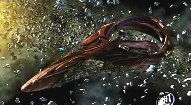 Raketoplán letí do hustého asteroidového pole na pomoc Seleyi, která vysílá automatický nouzový signál. 
