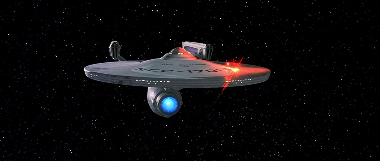 Cestou na Khitomer se Enterprise střetne s klingonskou lodí, která může střílet i zamaskovaná